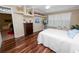 Bright bedroom with hardwood floors and built-in shelving at 2356 Lake James Way, Lakeland, FL 33810