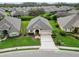 One-story house in a residential neighborhood with a large yard at 2356 Lake James Way, Lakeland, FL 33810