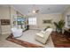 Relaxing living room with hardwood floors and built-in shelving at 2356 Lake James Way, Lakeland, FL 33810