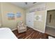 Spacious bedroom with wood-look floors and calming decor at 2356 Lake James Way, Lakeland, FL 33810
