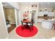 Bright eat-in kitchen with breakfast nook and access to a sunroom at 2356 Lake James Way, Lakeland, FL 33810
