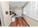 Bright home office features built-in shelving and hardwood floors at 2356 Lake James Way, Lakeland, FL 33810