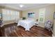Spacious bedroom with hardwood floors and large windows at 2356 Lake James Way, Lakeland, FL 33810