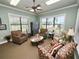 Relaxing clubhouse lounge with comfortable seating at 2356 Lake James Way, Lakeland, FL 33810