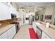 Well-equipped kitchen with white cabinets and a large island at 2356 Lake James Way, Lakeland, FL 33810