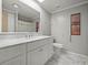 Updated bathroom with marble vanity and gray walls at 134 Lake Hazel Dr, Winter Haven, FL 33884