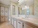 Double vanity bathroom with updated countertops at 134 Lake Hazel Dr, Winter Haven, FL 33884