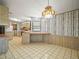 Bright dining area with a lovely light fixture at 134 Lake Hazel Dr, Winter Haven, FL 33884