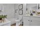 Clean bathroom with a bathtub, toilet and modern vanity at 1419 S Lincoln Ave, Lakeland, FL 33803