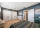 Spacious bedroom with a dresser, built-in closet, and decorative rug at 17 Loma Verde # 17, Lakeland, FL 33813