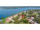 Aerial view showcasing the home's lakefront location and surrounding area at 17 Loma Verde # 17, Lakeland, FL 33813