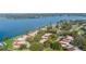 Aerial view of community near lake, showing home location at 17 Loma Verde # 17, Lakeland, FL 33813