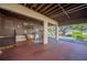 Covered carport with rocking chair and lake view at 17 Loma Verde # 17, Lakeland, FL 33813
