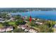 Aerial view of lakefront property, highlighting home's position at 17 Loma Verde # 17, Lakeland, FL 33813