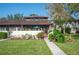 Attractive landscaping and walkway to the front door at 17 Loma Verde # 17, Lakeland, FL 33813