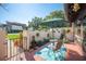 Private patio with seating, fire pit, and gate at 17 Loma Verde # 17, Lakeland, FL 33813