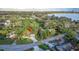 Aerial view of house with lake view in the background at 1806 17Th Nw St, Winter Haven, FL 33881