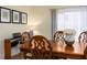 Elegant dining room with a large wood table and chairs at 1806 17Th Nw St, Winter Haven, FL 33881