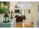 Living room with leather sofas and a fireplace at 1806 17Th Nw St, Winter Haven, FL 33881