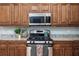 Modern kitchen with granite countertops and stainless steel appliances at 1806 17Th Nw St, Winter Haven, FL 33881