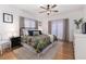 Spacious bedroom with hardwood floors, king bed, and a view at 1806 17Th Nw St, Winter Haven, FL 33881