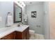 Updated bathroom with a vanity, shower, and modern fixtures at 1806 17Th Nw St, Winter Haven, FL 33881