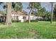Charming house with lush landscaping and a carport at 1806 17Th Nw St, Winter Haven, FL 33881