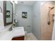 Clean bathroom, featuring a walk-in shower, vanity, and modern fixtures at 1806 17Th Nw St, Winter Haven, FL 33881