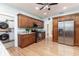 Updated kitchen with stainless steel appliances and wood cabinets at 1806 17Th Nw St, Winter Haven, FL 33881