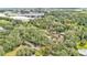 Aerial view of a mobile home in a wooded area at 2515 George Wheeler Rd, Lakeland, FL 33810