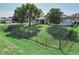 House with fenced backyard, large trees and spacious lawn at 300 Winona Ct, Auburndale, FL 33823