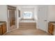 Bathroom with a shower, bathtub, and double vanity at 300 Winona Ct, Auburndale, FL 33823