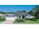 Beautiful one-story home with a two-car garage at 300 Winona Ct, Auburndale, FL 33823