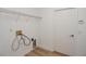 Laundry room with hookups and built-in shelving at 300 Winona Ct, Auburndale, FL 33823