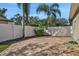 Private backyard with brick pavers and tall fence at 109 Costa Loop, Auburndale, FL 33823