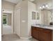 Bathroom with vanity, linen closet and pool view at 109 Costa Loop, Auburndale, FL 33823