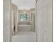 Elegant bathroom with soaking tub, shower, and double sinks at 109 Costa Loop, Auburndale, FL 33823