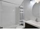 Bathroom with a shower/tub combo and modern vanity at 109 Costa Loop, Auburndale, FL 33823
