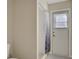 Small bathroom with shower and exterior access at 109 Costa Loop, Auburndale, FL 33823