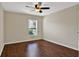 Bedroom with hardwood floors and ceiling fan at 109 Costa Loop, Auburndale, FL 33823