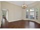 Bright dining room with hardwood floors and a bay window at 109 Costa Loop, Auburndale, FL 33823