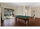Game room featuring a pool table and hardwood floors at 109 Costa Loop, Auburndale, FL 33823