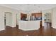 Open kitchen with island and stainless steel appliances at 109 Costa Loop, Auburndale, FL 33823