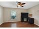 Home office with hardwood floors and built-in shelving at 109 Costa Loop, Auburndale, FL 33823