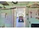 View from workshop into covered patio with golf cart at 1742 Fox Hill Dr, Lakeland, FL 33810