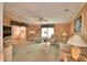 Spacious living room with comfy seating and a view into another room at 1742 Fox Hill Dr, Lakeland, FL 33810