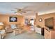 Living room with open floor plan and views of dining area and kitchen at 1742 Fox Hill Dr, Lakeland, FL 33810