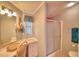 Updated bathroom with vanity, mirror, and shower at 1742 Fox Hill Dr, Lakeland, FL 33810