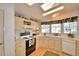 Well-lit kitchen featuring ample counter space and cabinets at 1742 Fox Hill Dr, Lakeland, FL 33810