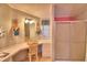 Well-appointed bathroom with vanity, mirror, and shower at 1742 Fox Hill Dr, Lakeland, FL 33810